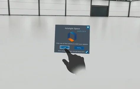 Screenshot of Hololight Space running on a mixed reality device with the user selecting load on the welcome screen.