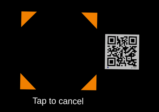 Screenshot of Hololight Space running on Microsoft HoloLens 2 showing the QR code scanning reticule